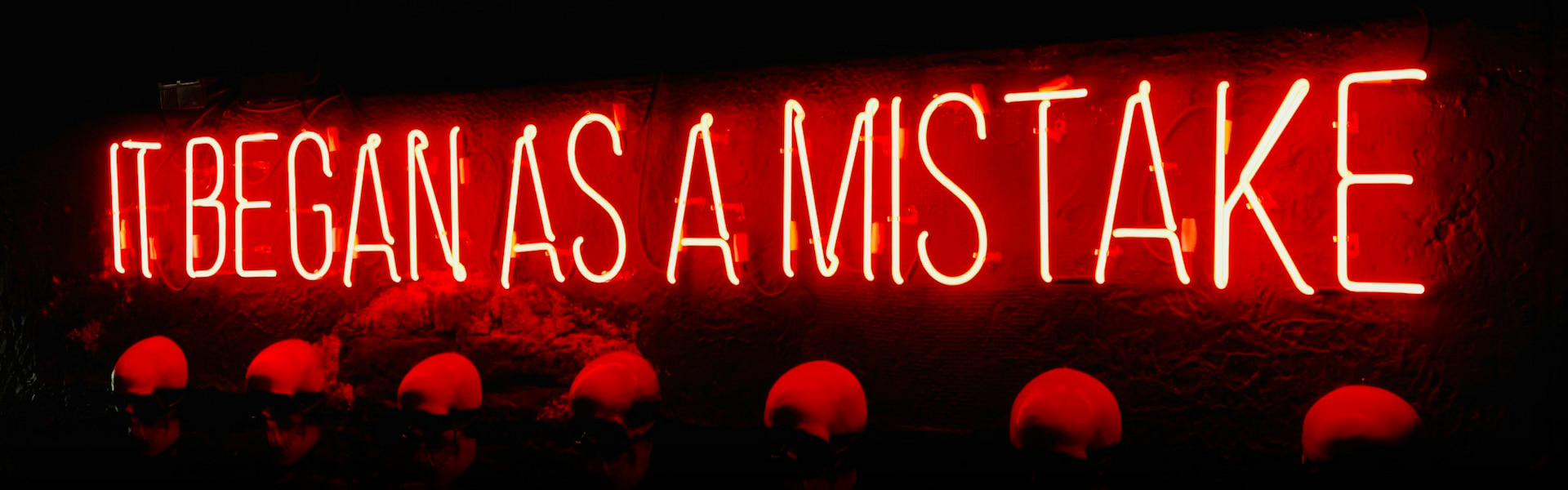Text saying "It began as a mistake"